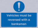 vehicles-must-be-reversed-with-a-banksman~